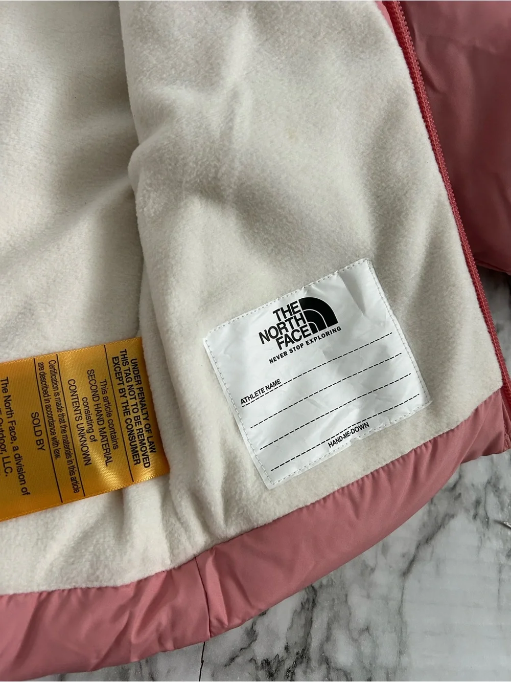The North Face baby girls 6-12 months 600 fill recycled down hooded jacket